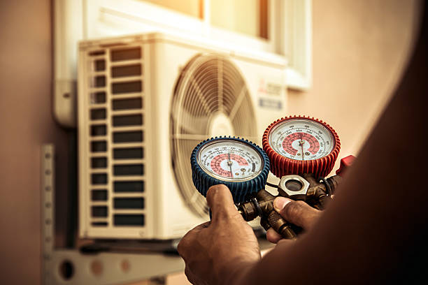 Professional Air Conditioning Service technician working in Rapid City, SD